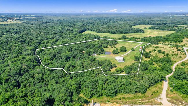 Birds eye view of property with a forest view | Image 13