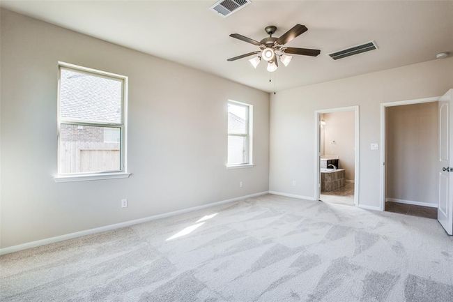 Primary Suite opens to an ensuite private bathroom | Image 14