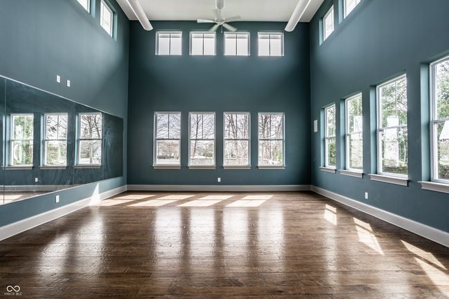 Amenities include multiple swimming pools, a fitness/workout center, playgrounds, a 15-acre park, dog park, racquet courts, a clubhouse w/ banquet facilities, miles of biking and walking paths and more! | Image 55