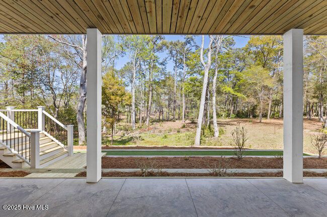 View from covered outdoor living space ground floor. | Image 32
