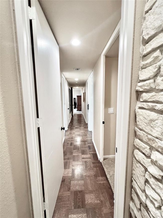 Hallway to bedrooms | Image 19