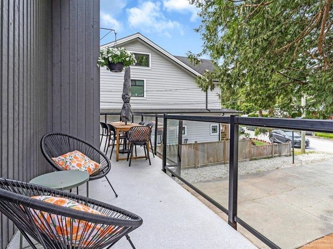 West facing balcony overlooking the breathtaking tree w seating + a wrecking ball for the kids to swing on, a fire table area, garden box, a basketball hoop, & 6 parking incl. a 2 car carport. B.G School is at end of the block! The ocean is 4 blocks away! | Image 12