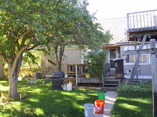 View of yard featuring a wooden deck | Image 5