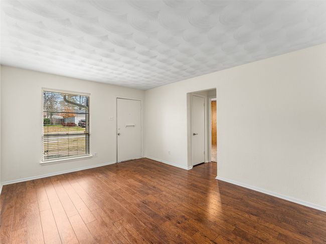 Entry living room featuring dark wood-type flooring | Image 7