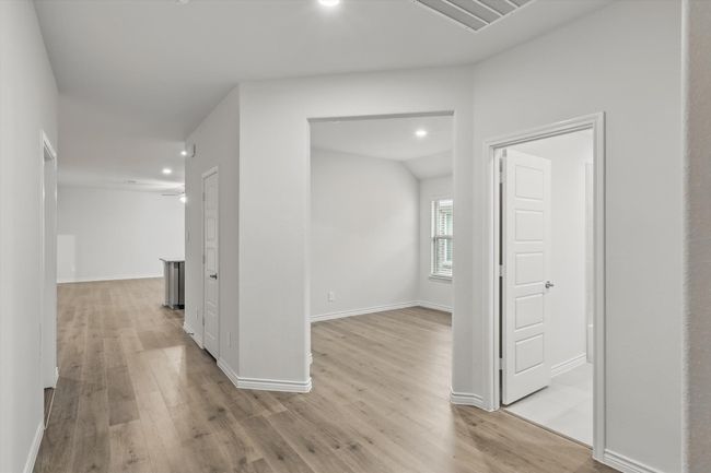 Hall with recessed lighting and light wood finished floors | Image 6