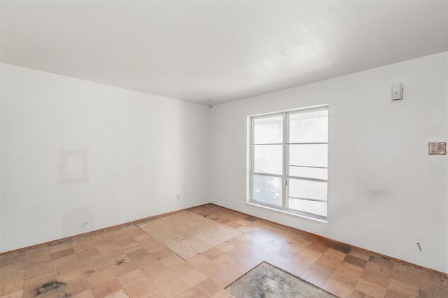Unfurnished room featuring baseboards | Image 12