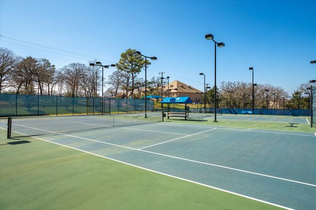 View of tennis court featuring community basketball court | Image 22