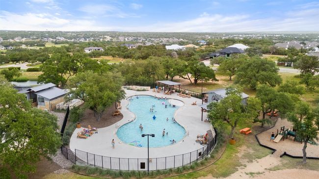 Drone / aerial view of a The Cove, Caliterra's pool complex. | Image 32