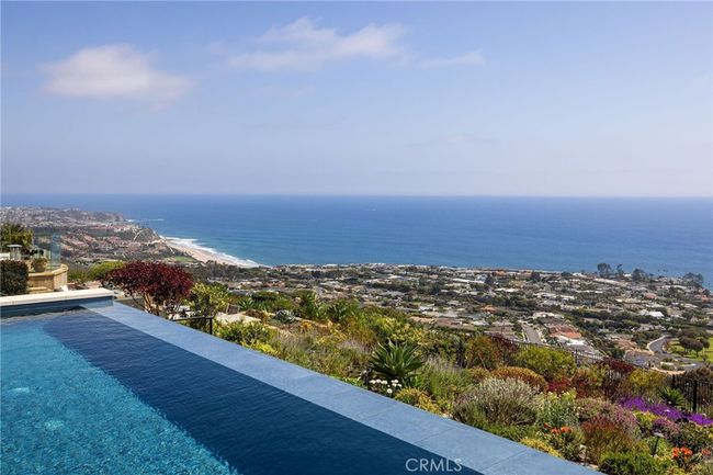 Soak in the sun and coastline, white-water views from your private infiinity-edge pool. | Image 32