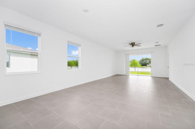 1596 Contentment Loop, House other with 3 bedrooms, 2 bathrooms and null parking in KISSIMMEE FL | Image 11