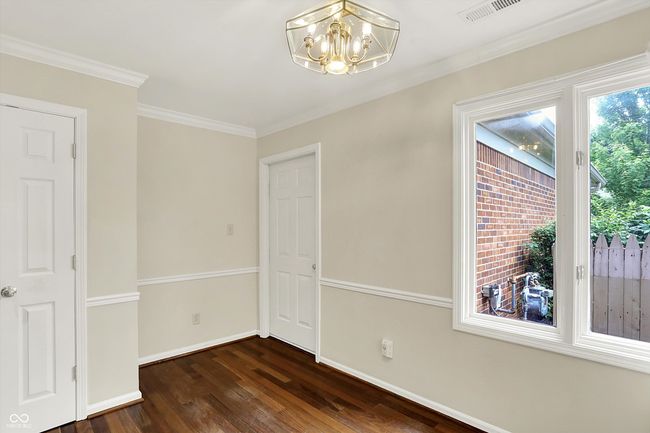 Eat-in kitchen area w/ garage entry door | Image 27