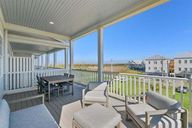 Additional view of porch facing Galveston Bay. | Image 11