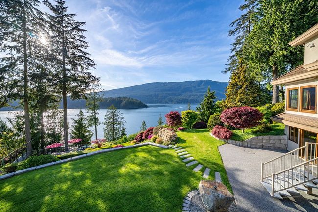 View of yard featuring a water and mountain view and stairway | Image 6