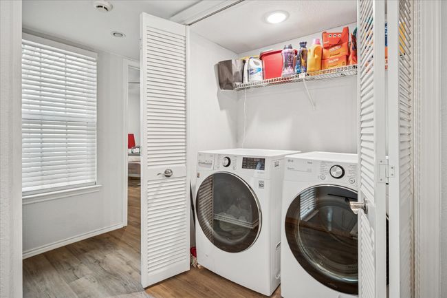 Laundry area convenient to both bedrooms! | Image 12
