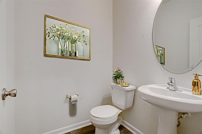Next to the office is the spacious half bathroom. | Image 6