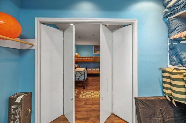 Downstairs large bunkroom with divider to separate into two rooms | Image 10