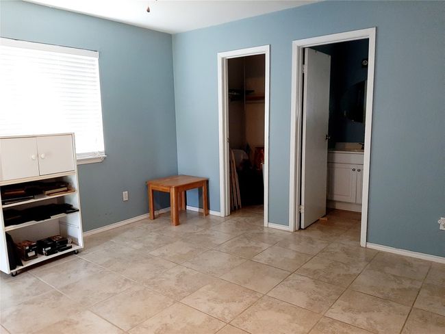 Unfurnished bedroom featuring ensuite bathroom, and a closet | Image 14
