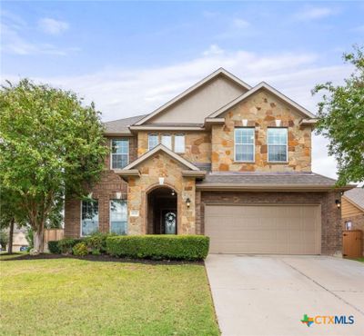 Look at this stunning home with features designed to impress. This is the place you will want to call HOME!!! | Image 1