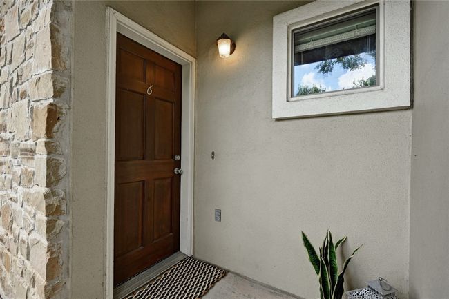 Front door with side entry for added privacy into the unit | Image 4