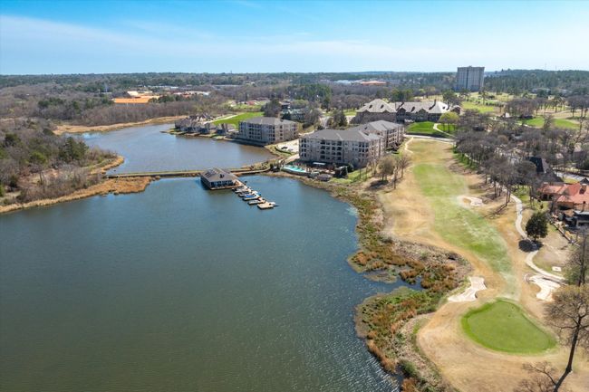 Aerial view of a nearby body of water and a golf club | Image 31