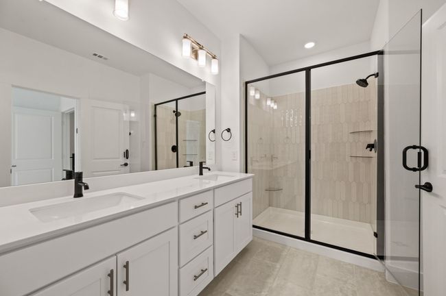 You'll find a lovely, spacious walk in shower in this dream owner's bath! | Image 14