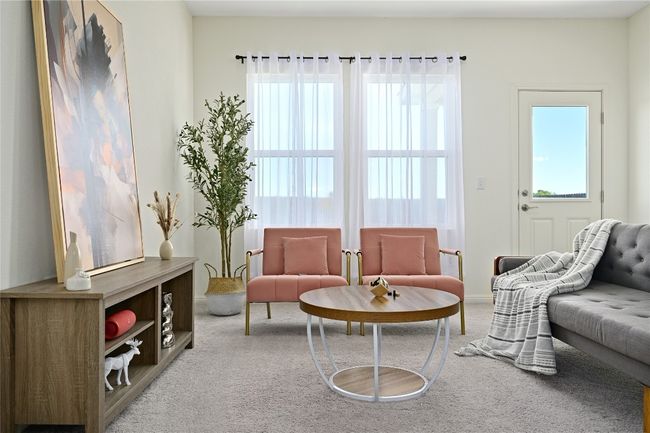 Living area featuring carpet and a healthy amount of sunlight | Image 13