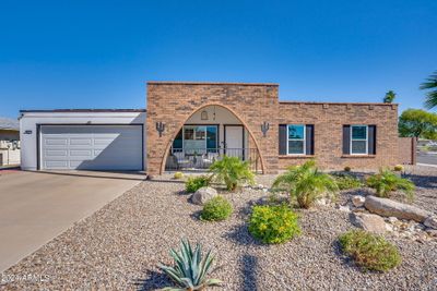 10702 W Hutton Drive, House other with 3 bedrooms, 2 bathrooms and null parking in Sun City AZ | Image 1