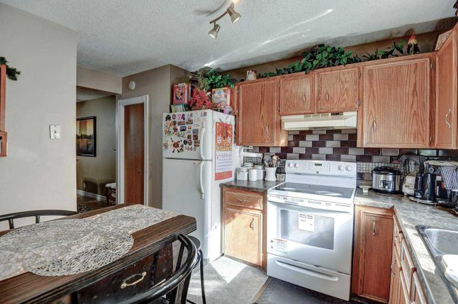 36 - 210 86 Avenue Se, Home with 4 bedrooms, 2 bathrooms and 1 parking in Calgary AB | Image 16