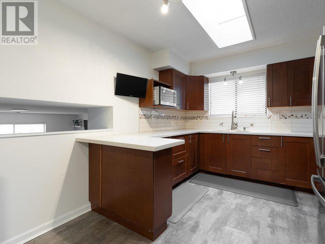 1269 Nestor St, House other with 4 bedrooms, 2 bathrooms and 1 parking in Coquitlam BC | Image 5