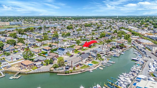 Aerial view of a large body of water and numerous boat docks | Image 34