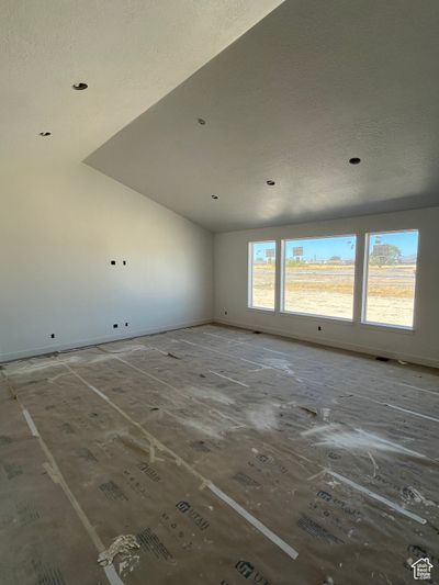 Unfurnished room featuring a textured ceiling | Image 3