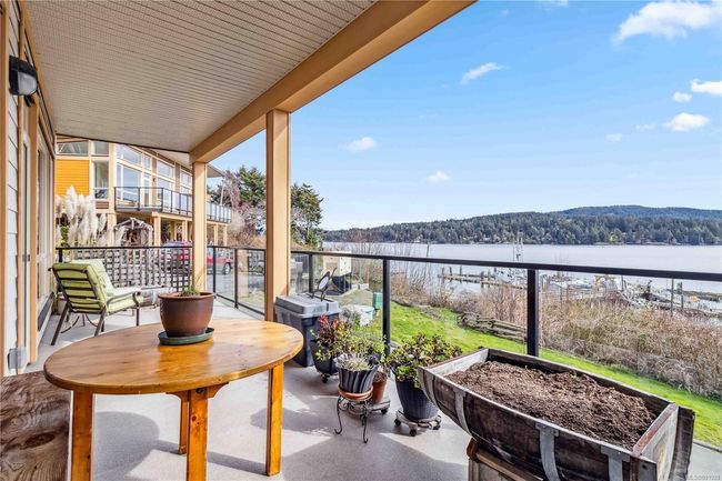 Balcony featuring a ocean view | Image 24