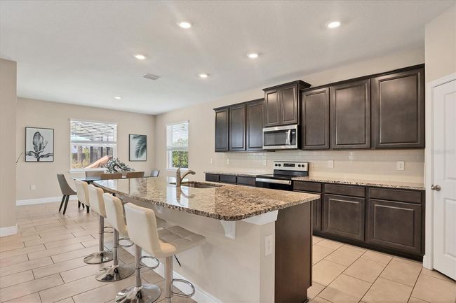 16606 Barnwood Place, House other with 4 bedrooms, 3 bathrooms and null parking in Lakewood Ranch FL | Image 18