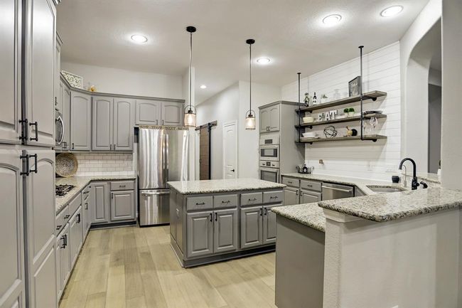 409 Holly Forest Dr, House other with 5 bedrooms, 4 bathrooms and 3 parking in Conroe TX | Image 9