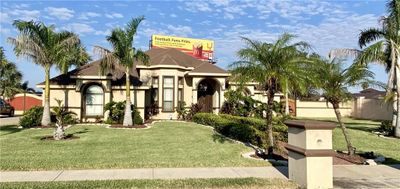 View of front of home featuring a front yard | Image 1