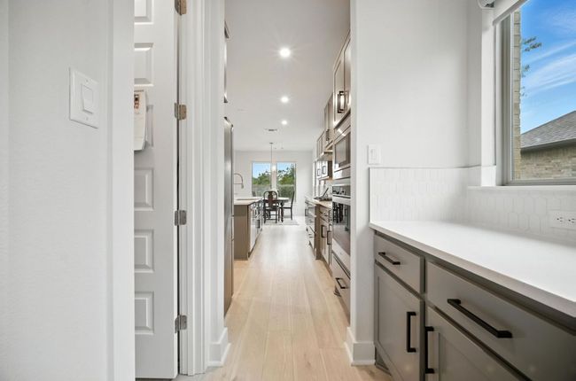 Hall featuring light wood finished floors and recessed lighting | Image 16
