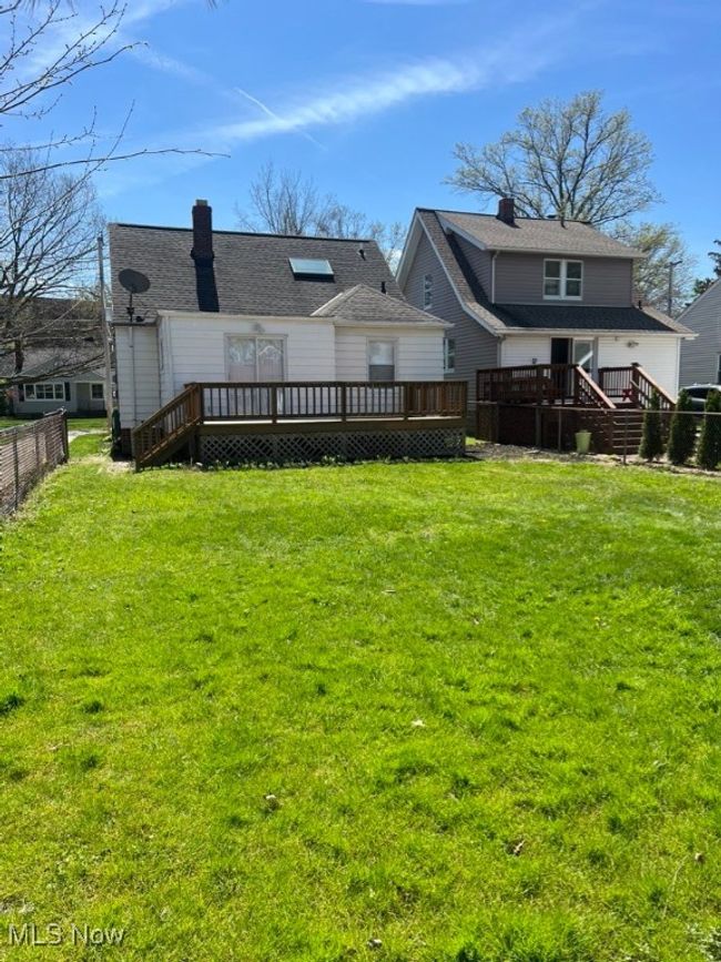 Back of property with a wooden deck and a lawn | Image 33