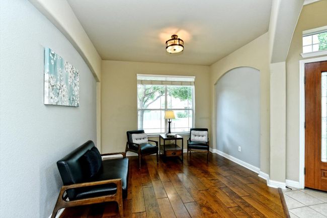 Sitting room featuring hardwood / wood-style floors and baseboards | Image 10