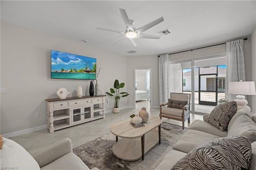 9051 Leatherwood Loop, LEHIGH ACRES, FL, 33936-4949 | Card Image