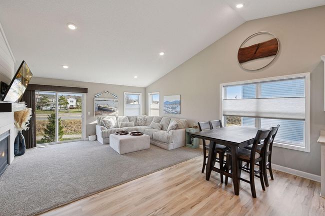 Dining room and living room with vaulted ceilings | Image 8