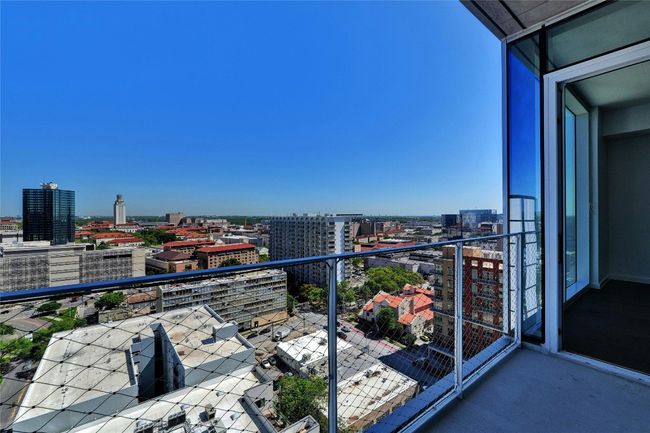 Balcony featuring a view of city | Image 30