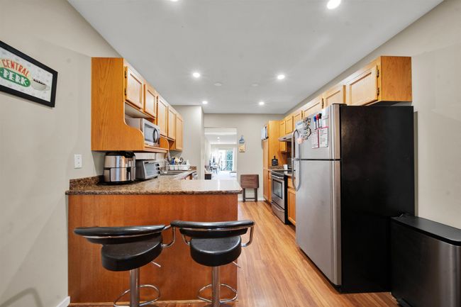 Living area featuring baseboards, carpet floors, and recessed lighting | Image 28