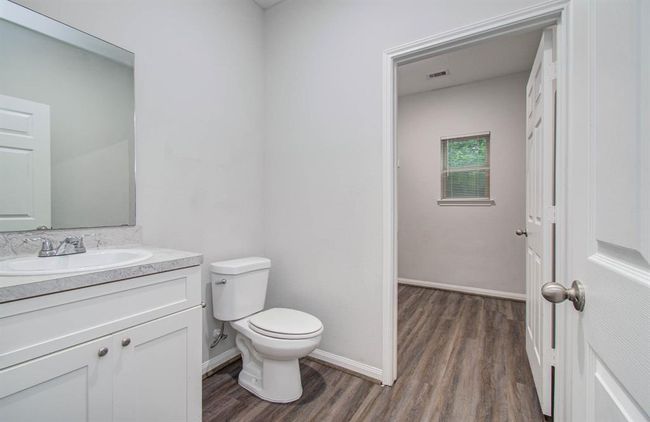 unit A half bath with Utility room | Image 14