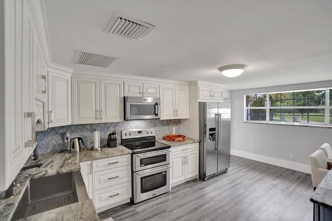 502 Rambling Drive Cir, House other with 5 bedrooms, 3 bathrooms and null parking in Wellington FL | Image 21