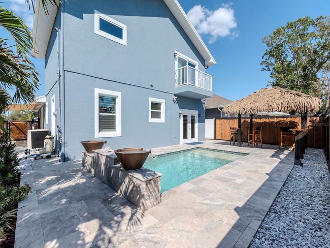 MASTER SUITE SLIDING GLASS DOORS TO BALCONY | Image 17
