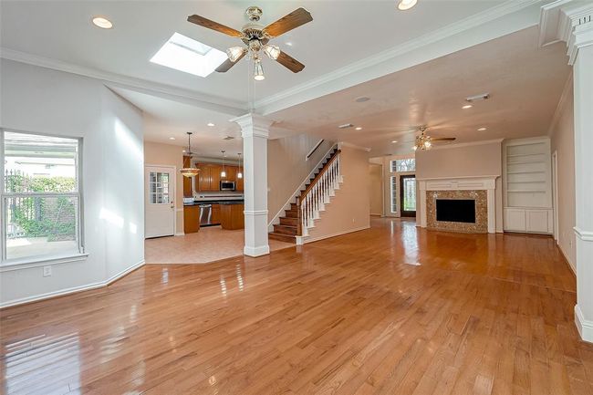 DEN with Fireplace, Skylight & Fan. | Image 8
