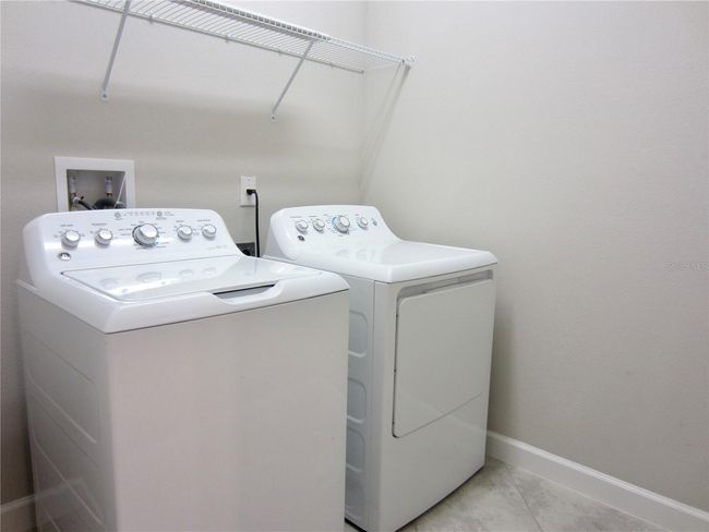 laundry room next to kitchen and Master bathroom | Image 31