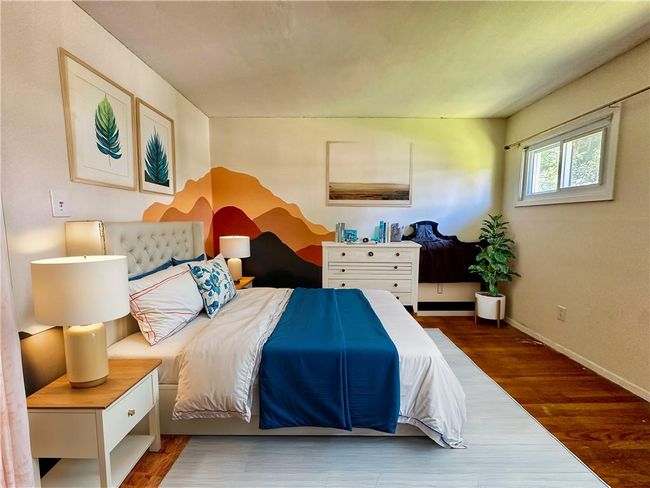 Virtually staged Bedroom featuring wood-type flooring | Image 18