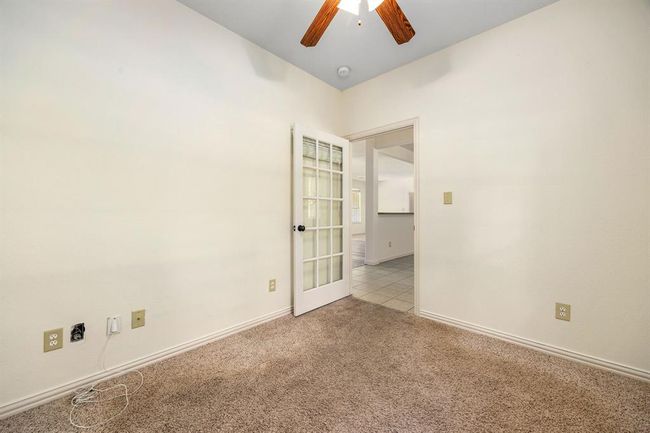 This room is located towards the front of the home and can be used as both and office or a bedroom. | Image 16