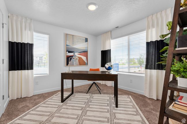Office space with carpet floors and a textured ceiling | Image 4